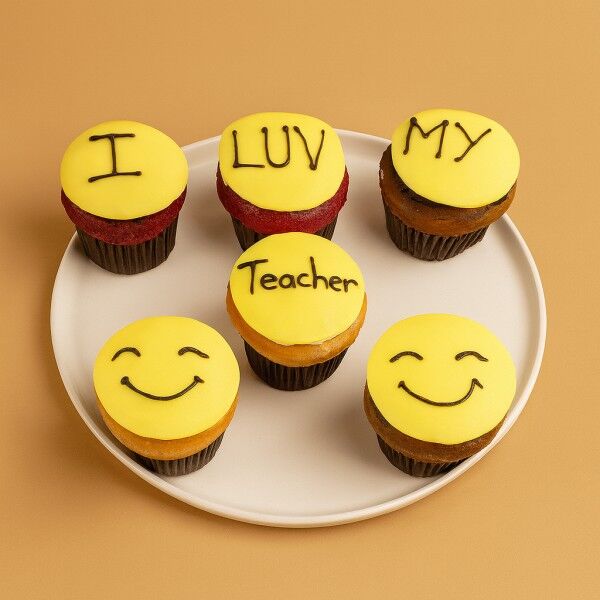 A set of 6 teachers day cupcakes