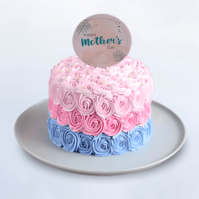 rosette cake with pink and blue frosting