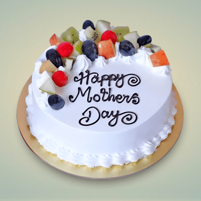 Mother’s Day fruit cake with white frosting and “Happy Mother’s Day” message