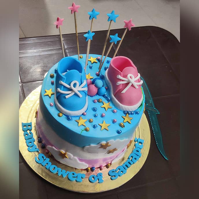 baby shower shoes cake blue and pink