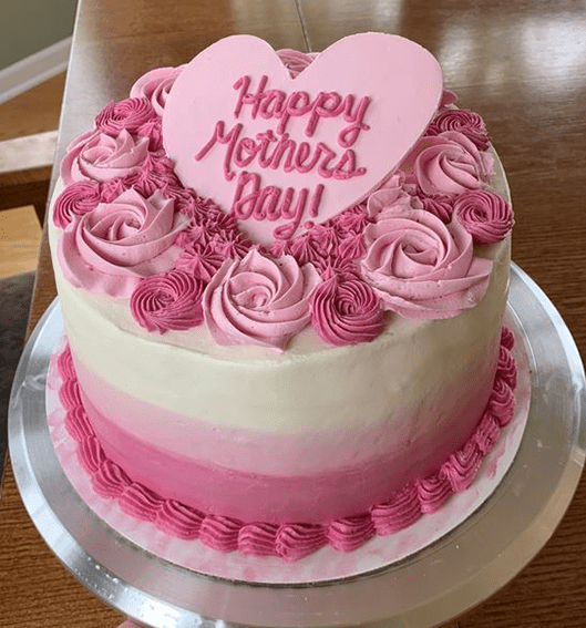 Mother’s Day special cake with pink ombré frosting and rose decorations
