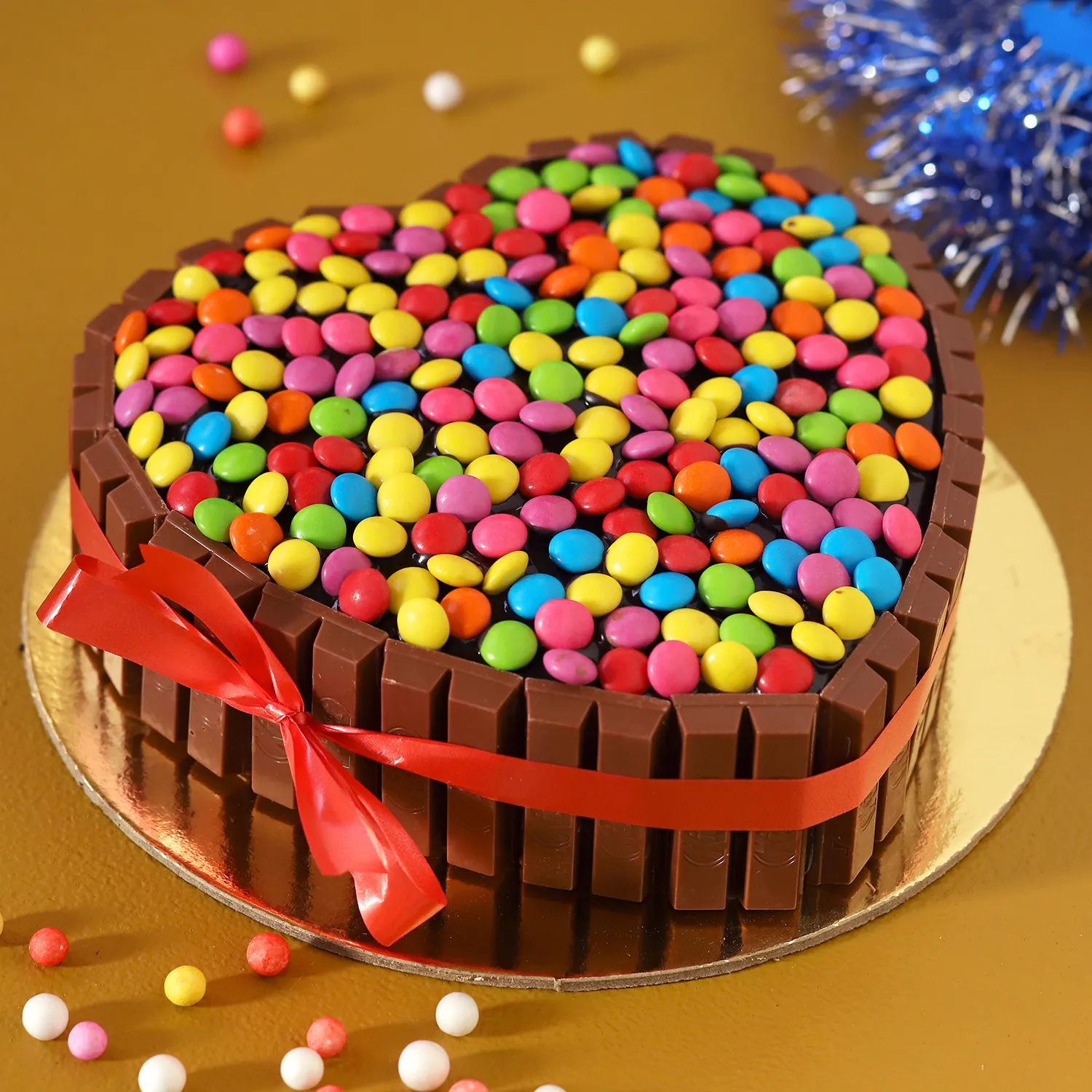 heart shaped kitkat chocolate cake with gems