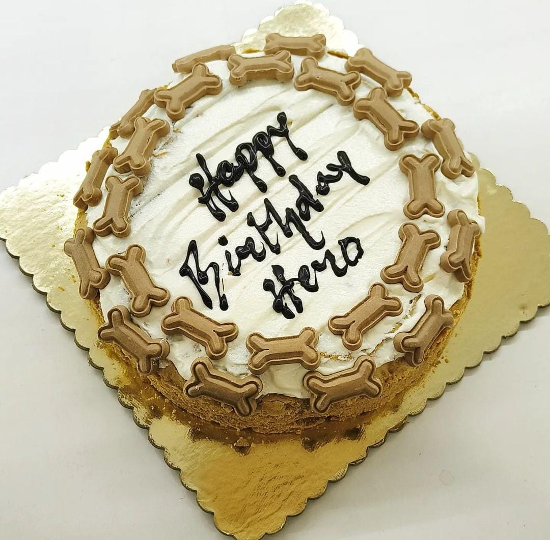 round dog cake with bone designs