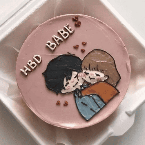 A cake filled with cuteness with a boy and girl showing there love