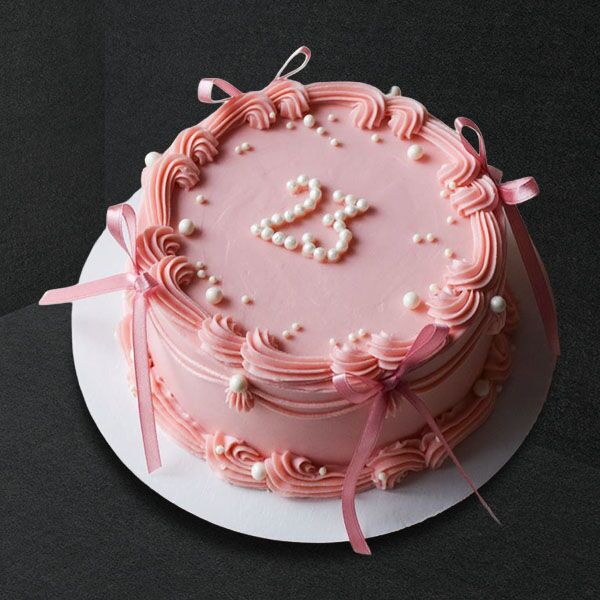 pearl pink ribbon cake
