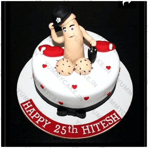 A cake with a dick on top of it.