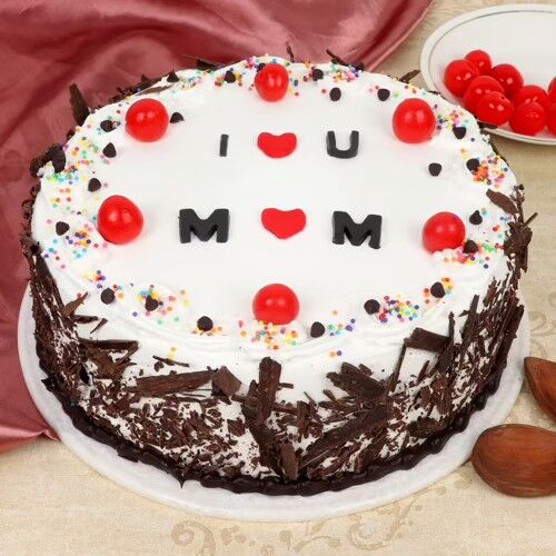 Mother’s Day special black forest cake with I ❤️ U MOM message, cherries, and chocolate shavings