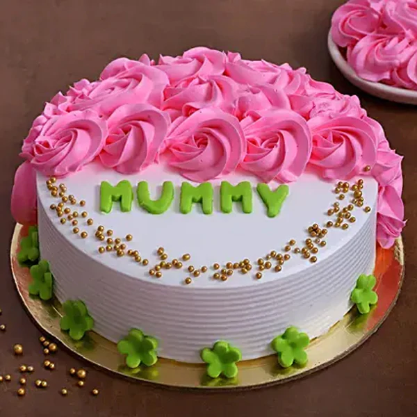 Mother’s Day cake with pink rose frosting and “Mummy” written on top