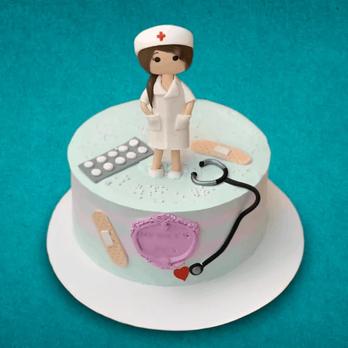 nurse cake with a fondant nurse figurine, stethoscope, pills, and bandages