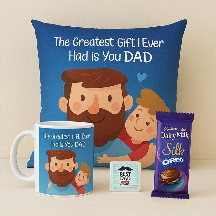 Father’s Day gift hamper with themed cushion, printed mug, Dairy Milk Silk chocolate, badge and heartfelt message for dad.