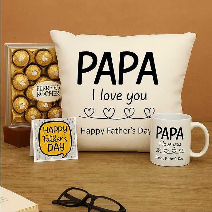 Father’s Day gift hamper featuring a cushion with "Papa I Love You" message, a matching mug, a box of Ferrero Rocher chocolates, and a greeting card