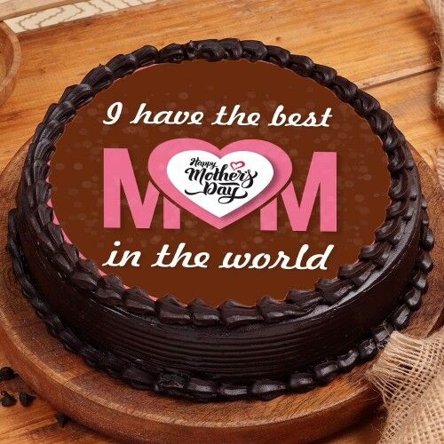 Mother’s Day chocolate cake with “I have the best MOM in the world” message and heart design