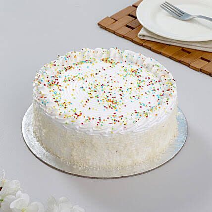 vanilla cream cake with sprinkles