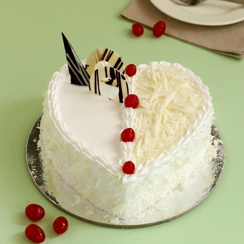 heart shaped white forest cake