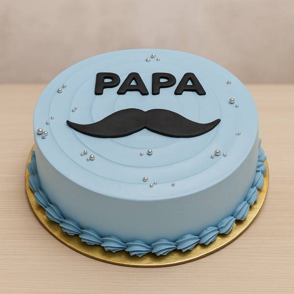 Blue cake with “Papa” and moustache design