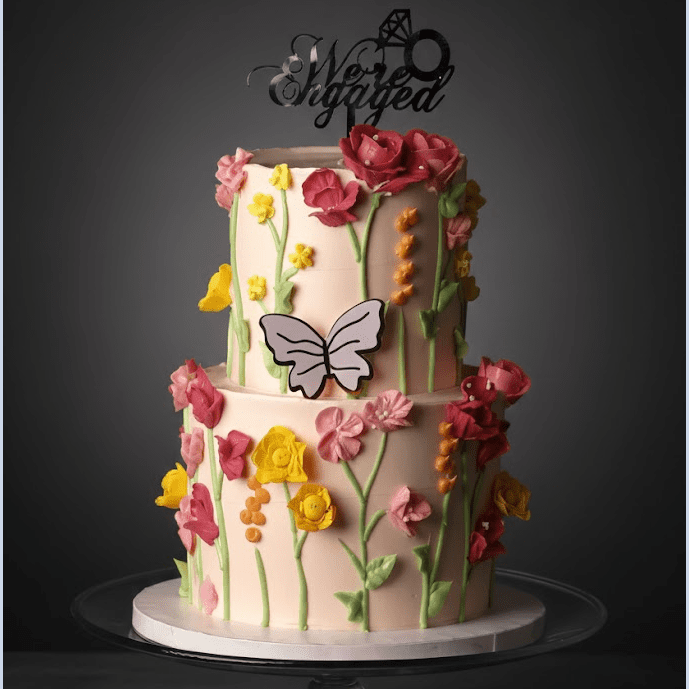 butterfly floral engagement cake