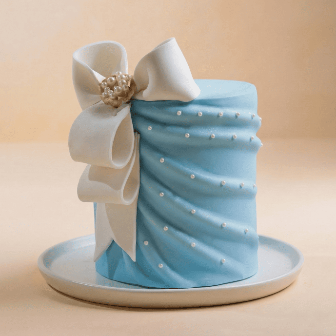 blue draped bow cake