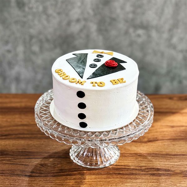 red rose groom tuxedo cake