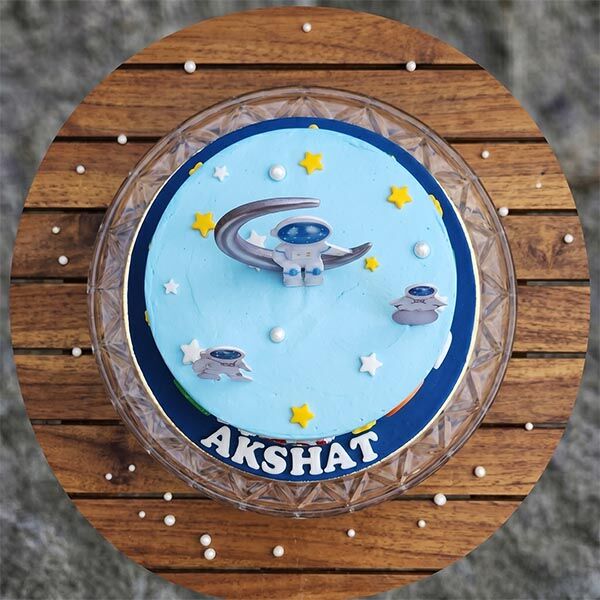 sky blue astronaut space cake top view