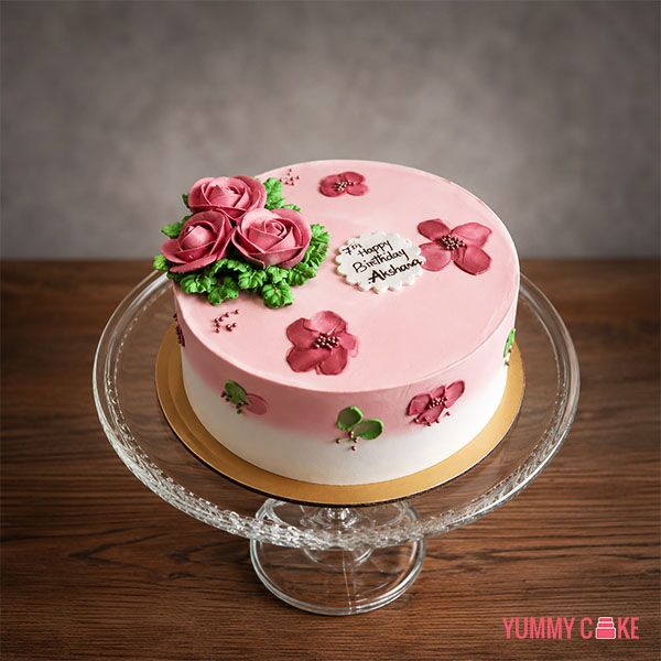 Pink and White Cake with Flowers