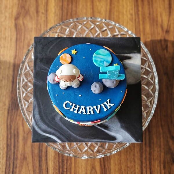 astronaut & rocket theme 1st birthday cake top view