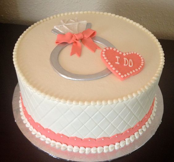 ring theme engagement cake