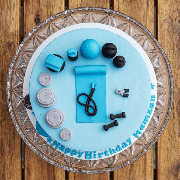 fitness equipment birthday cake top view