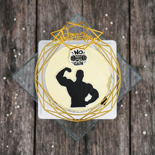 muscle power birthday cake top view