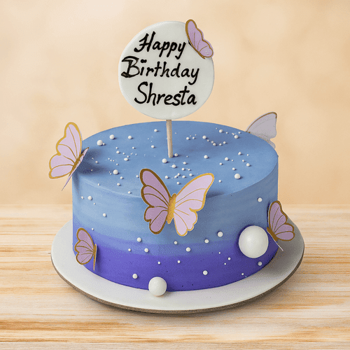 Butterfly theme birthday cake with ombre frosting and custom topper