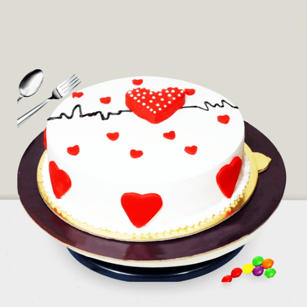 White cake with red hearts and a heartbeat line decoration